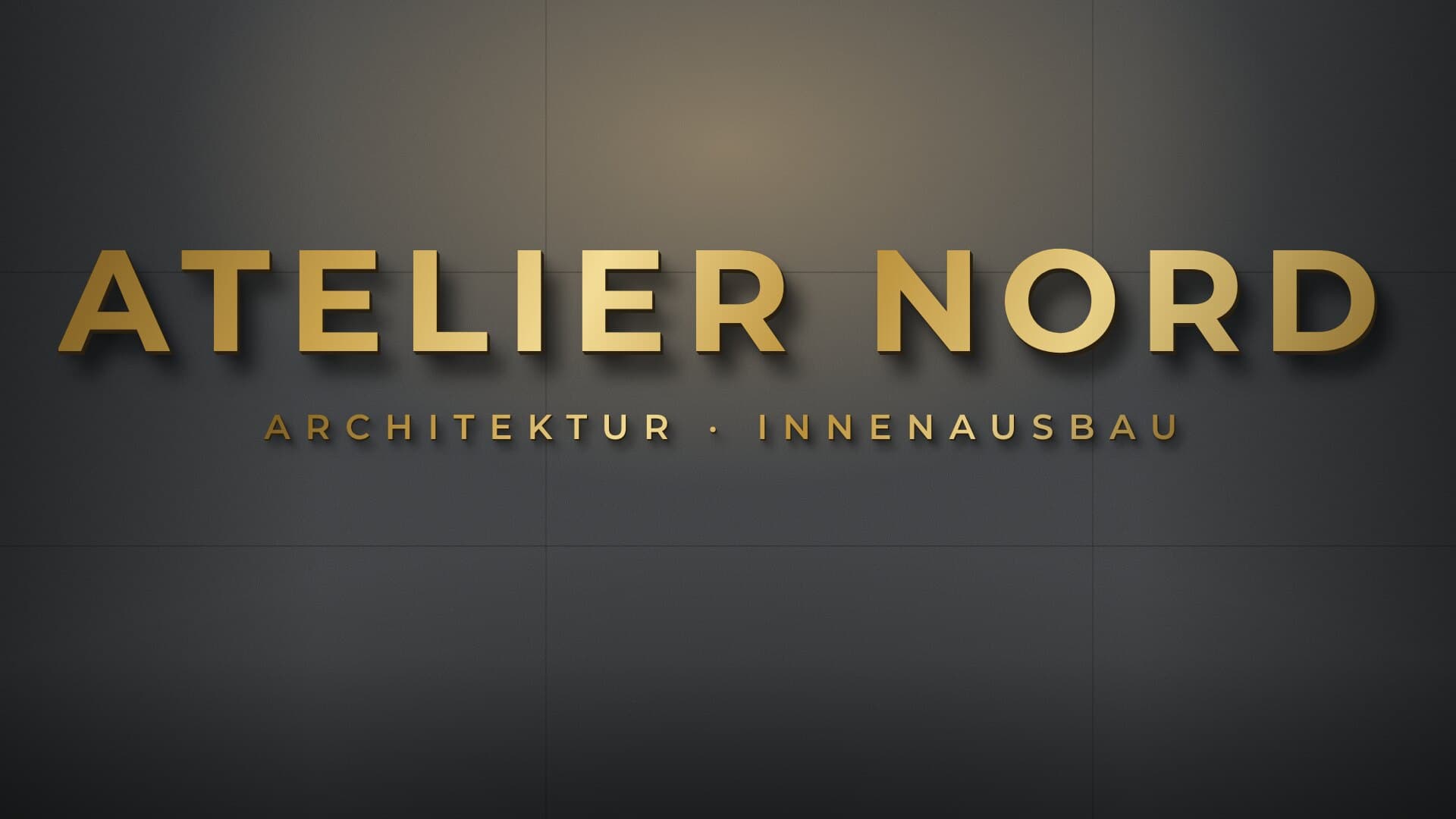 Goldene 3D-Buchstaben aus Alu an einer Atelierwand