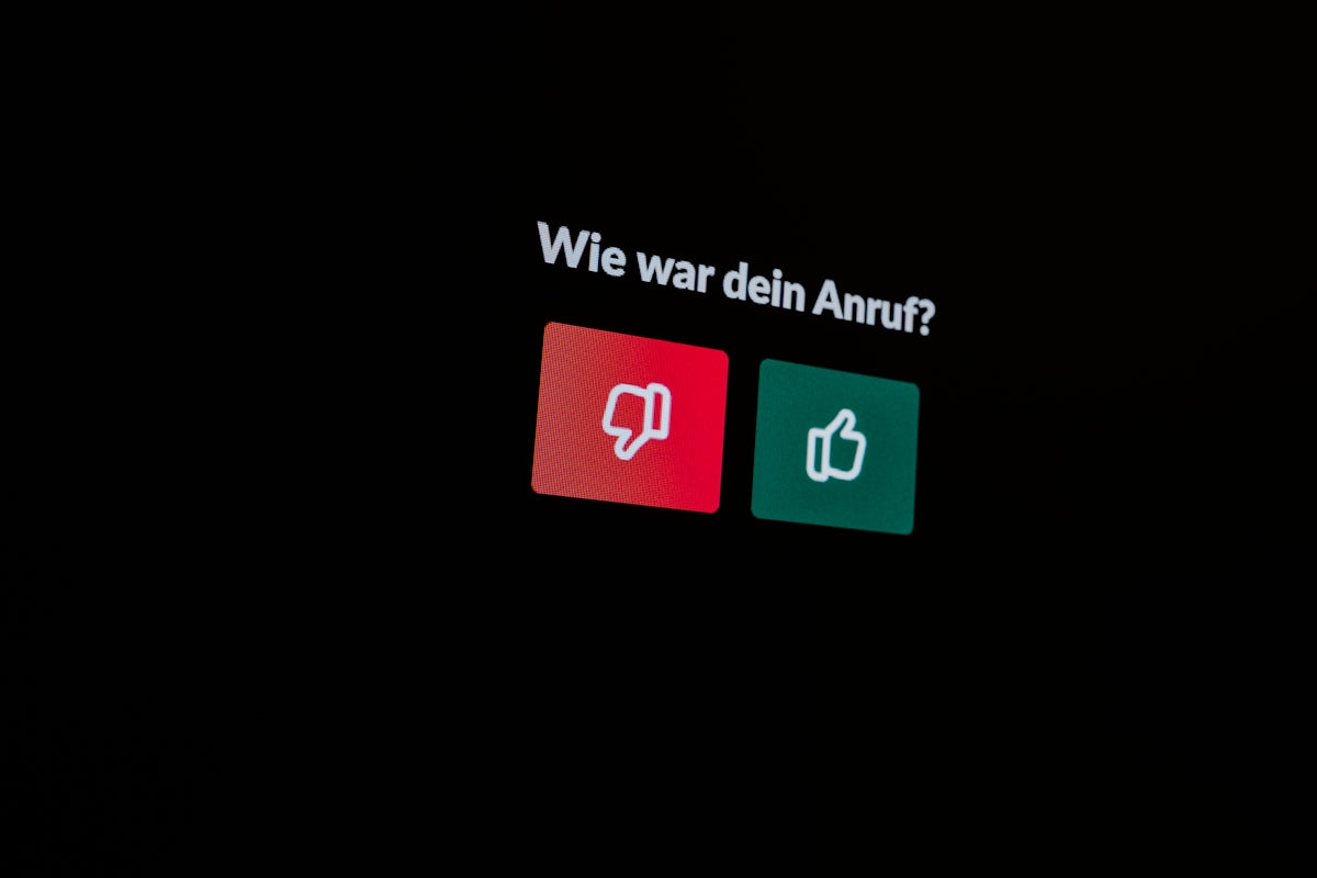 a black background with a red and green sign